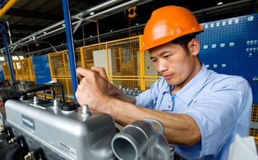Man in factory - banking your supply chain