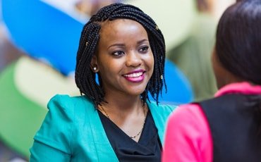 Lady talk to customer about corporate finance advice