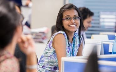 Female employee working at desk