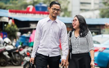 Couple in local street setting