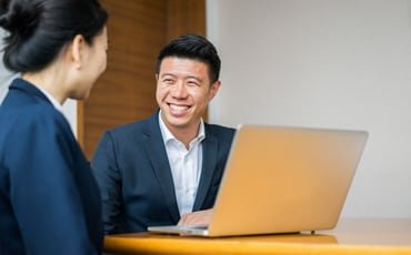 Staff helping client support their business