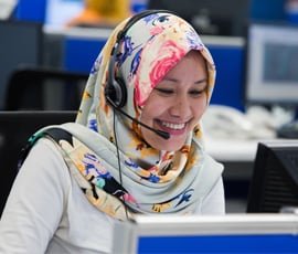24-hour customer service lady on telephone